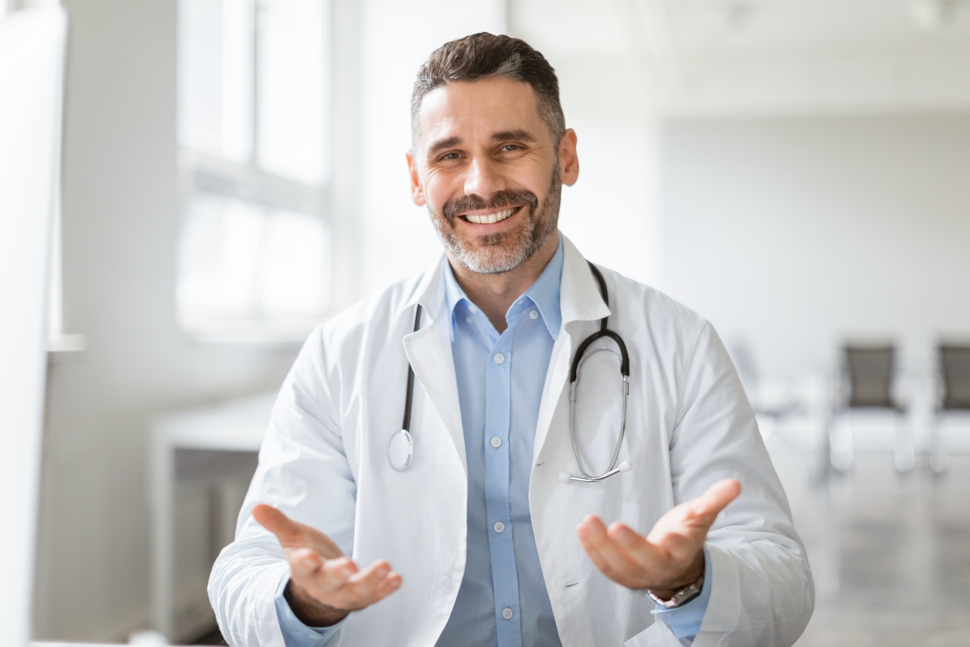 Patient's point of view of consultation with doctor, doc talking to camera, gesturing, explaining